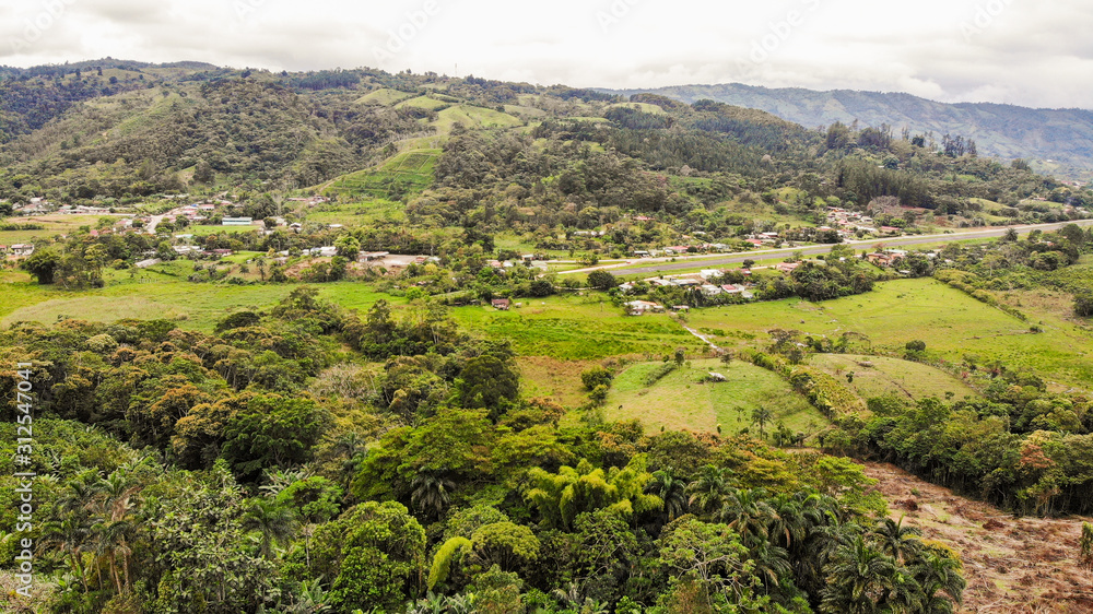 Aerial view of a rural airport and a small town in San Vito, Costa Rica