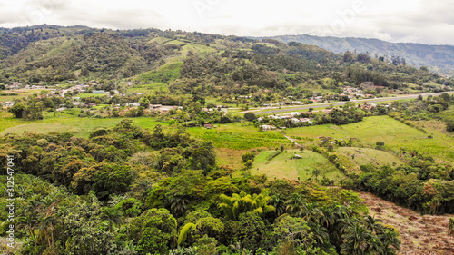 Aerial view of a rural airport and a small town in San Vito, Costa Rica