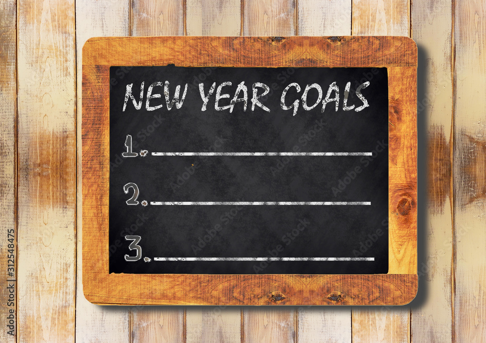 new year goals chalk on the blackboard