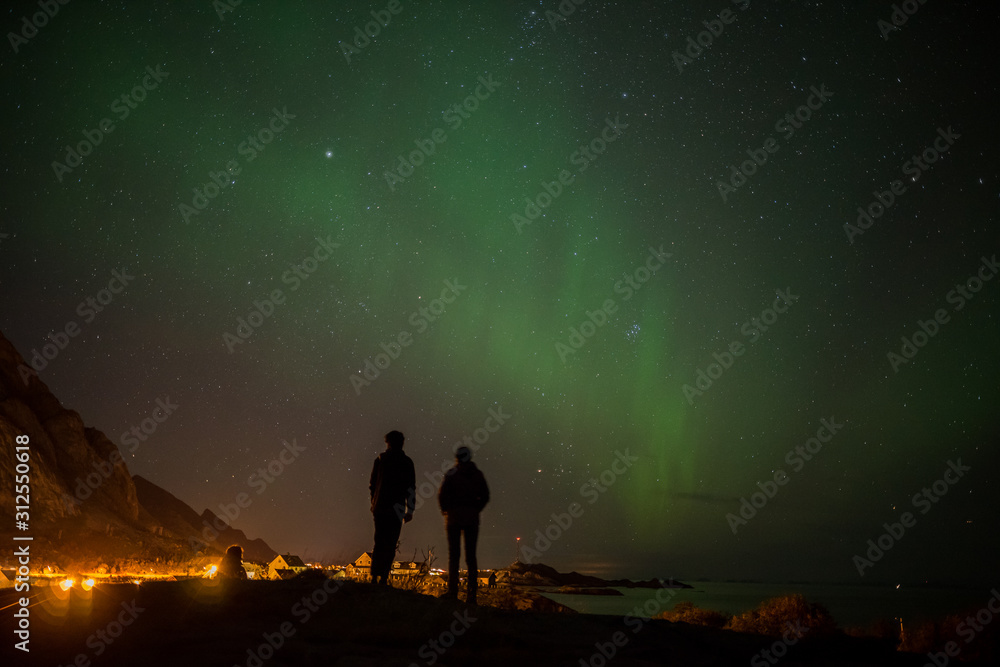 Couple looking at northern lights