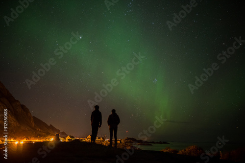 Couple looking at northern lights