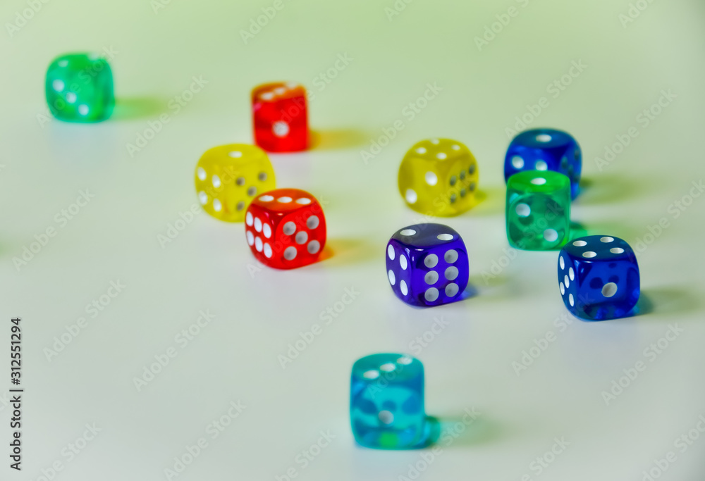 Side view of colourful dices on white background Side view of colourful dices on white background
