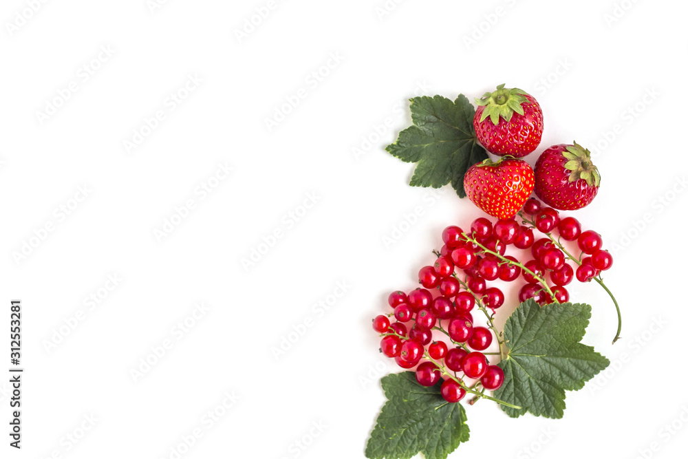 Juicy fresh strawberries and red currant with leaves on a white background. Copy space for text Juicy fresh strawberries and red currant with leaves on a white background. Copy space for text