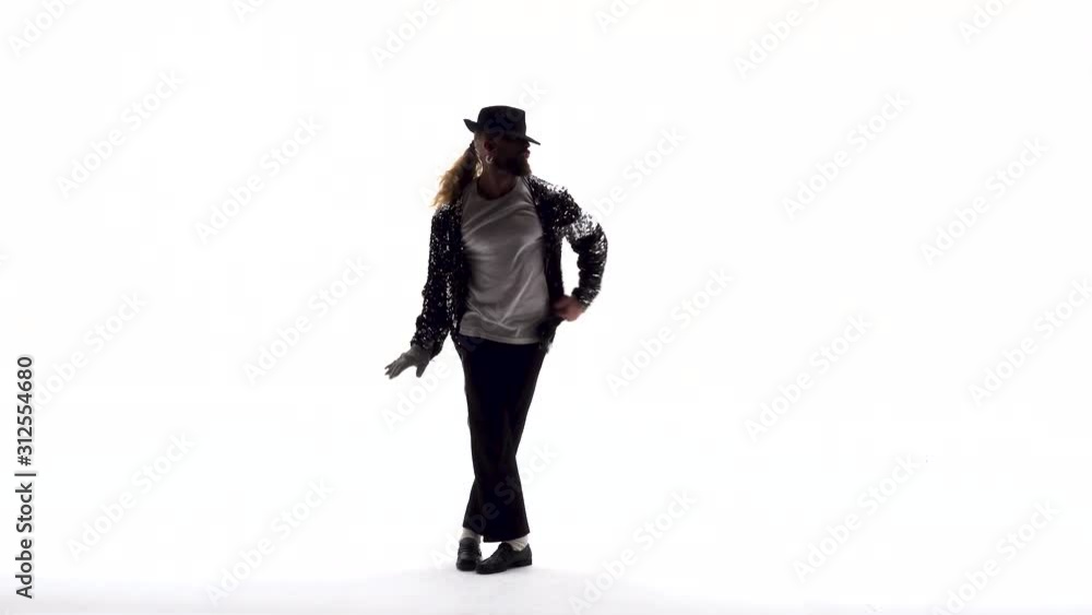 Young stylish teenager is showing dance moves. Isolated over white background. Young stylish teenager is showing dance moves. Isolated over white background.
