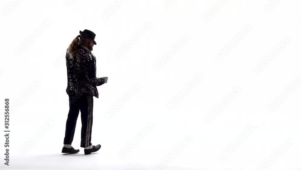 Young stylish teenager is showing dance moves. Isolated over white background. Young stylish teenager is showing dance moves. Isolated over white background.
