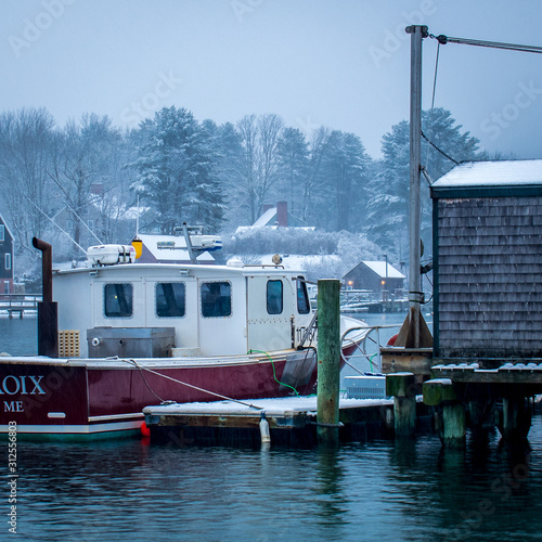 Fishing boat in York Harbor during a snowstorm