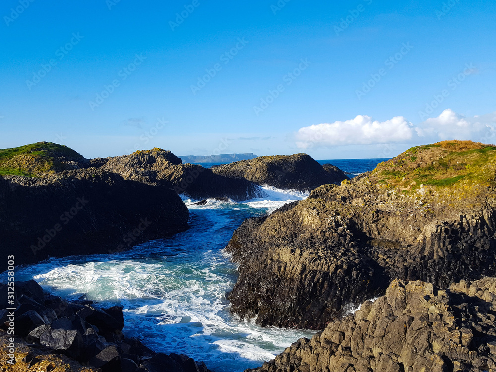 Basalt formations on the coast in Northern Ireland Basalt formations on the coast in Northern Ireland