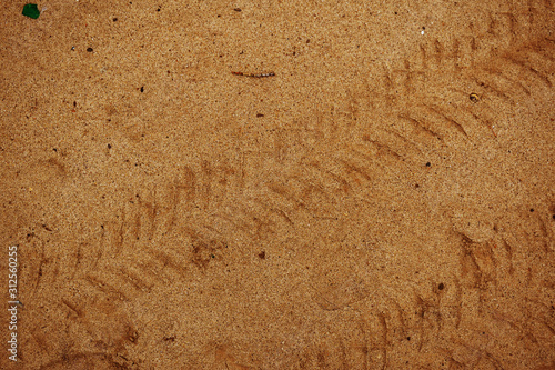 tire tracks on sand background texture