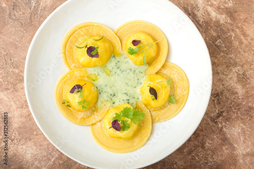 Ravioli on a plate, restaurant serving, close up.