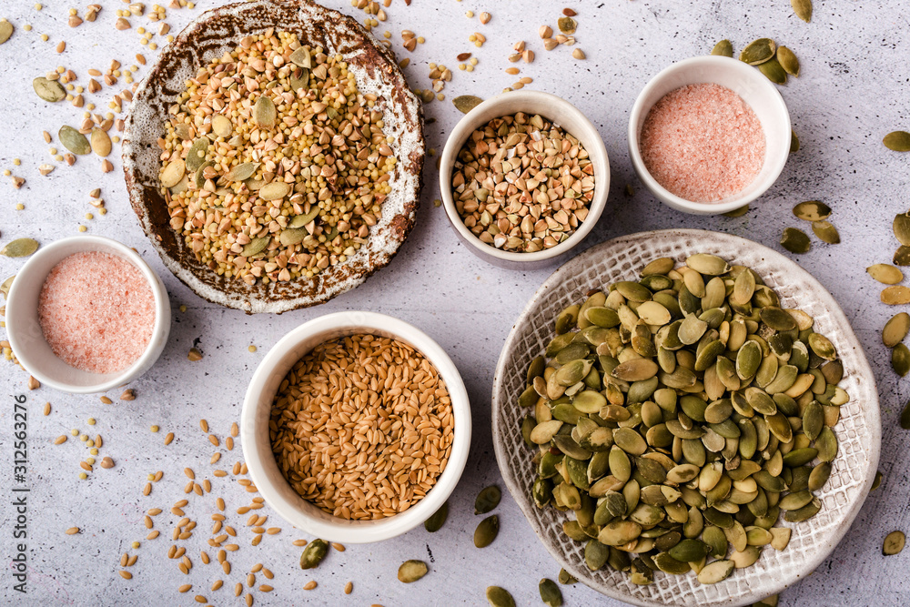 Various cereals and grains in bowls, healthy diet Various cereals and grains in bowls, healthy diet