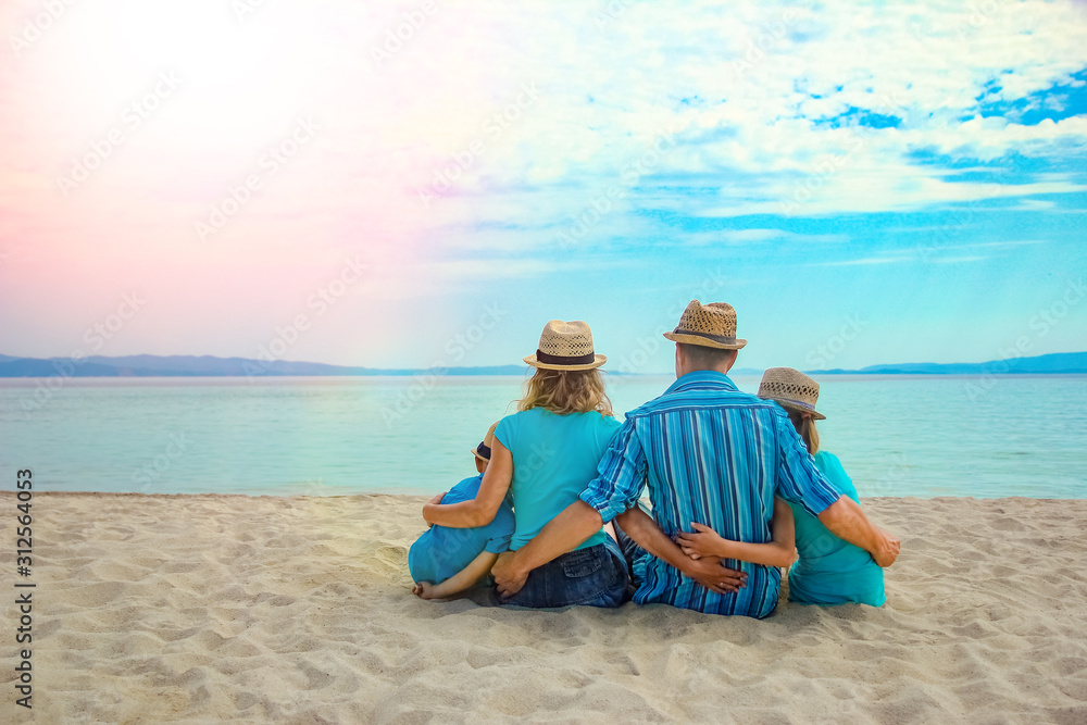 happy family at sea in greece on nature background