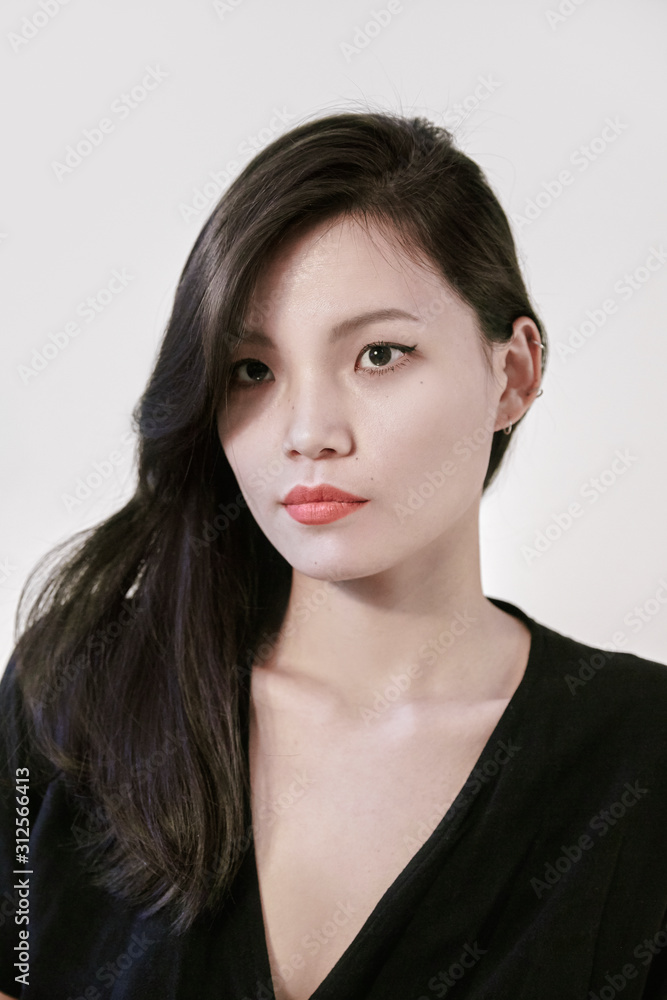Asian lady with long wavy hair Asian lady with long wavy hair