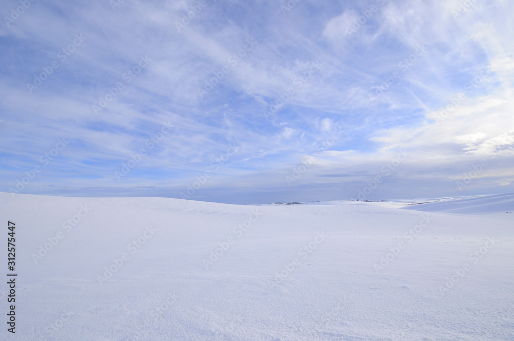 Fresh Snow and Cirrus Clouds Over the Palouse in IdahoFresh Snow and Cirrus Clouds Over the Palouse in Idaho