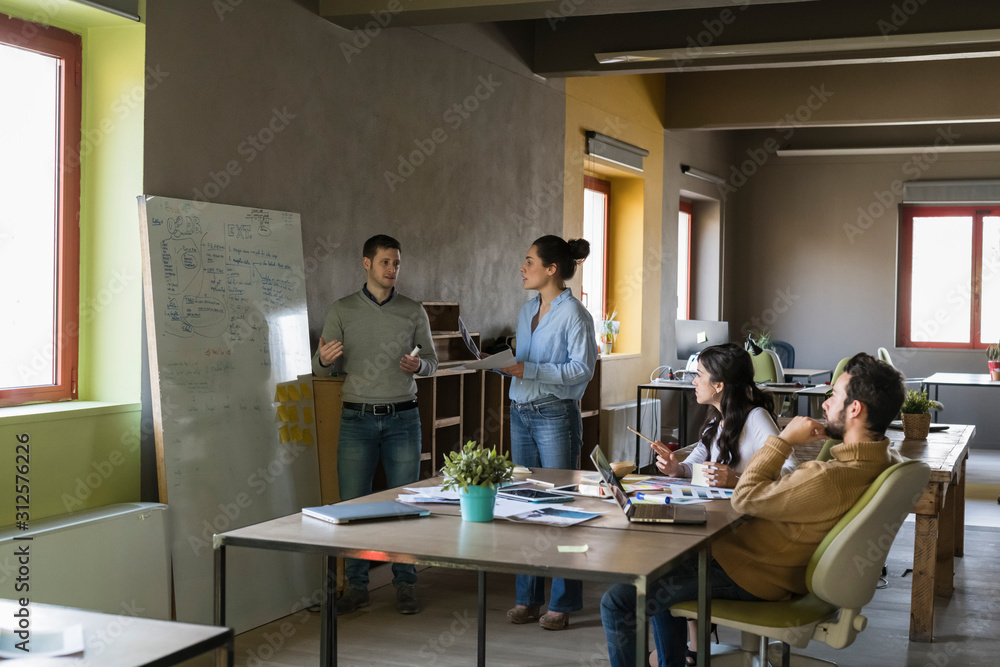Young businesspeople working in a modern office Young businesspeople working in a modern office