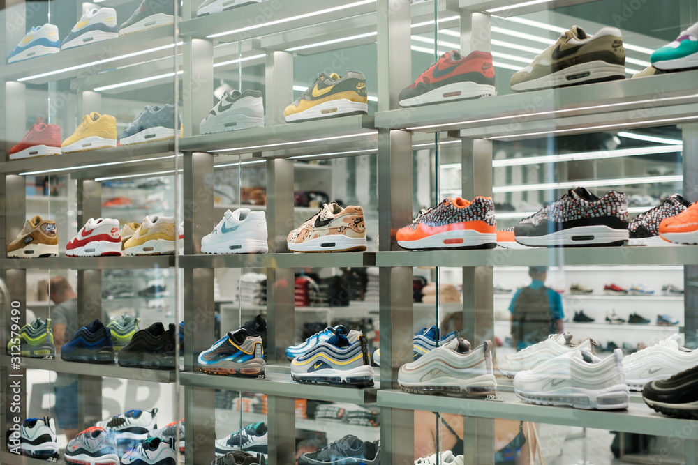 Nike sneaker collection / sport shoes in shopping window at store in -  Berlin, Germany - June 2018 Stock Photo | Adobe Stock