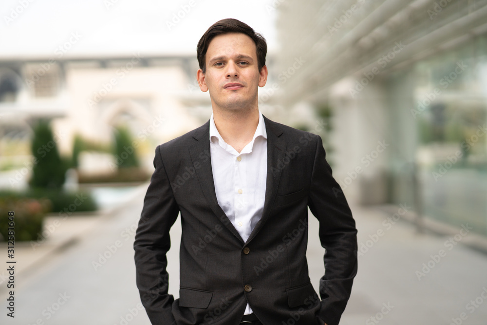 Businessman portrait with blurred background. Businessman portrait with blurred background.