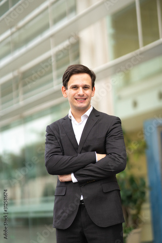 Businessman portrait with blurred background.