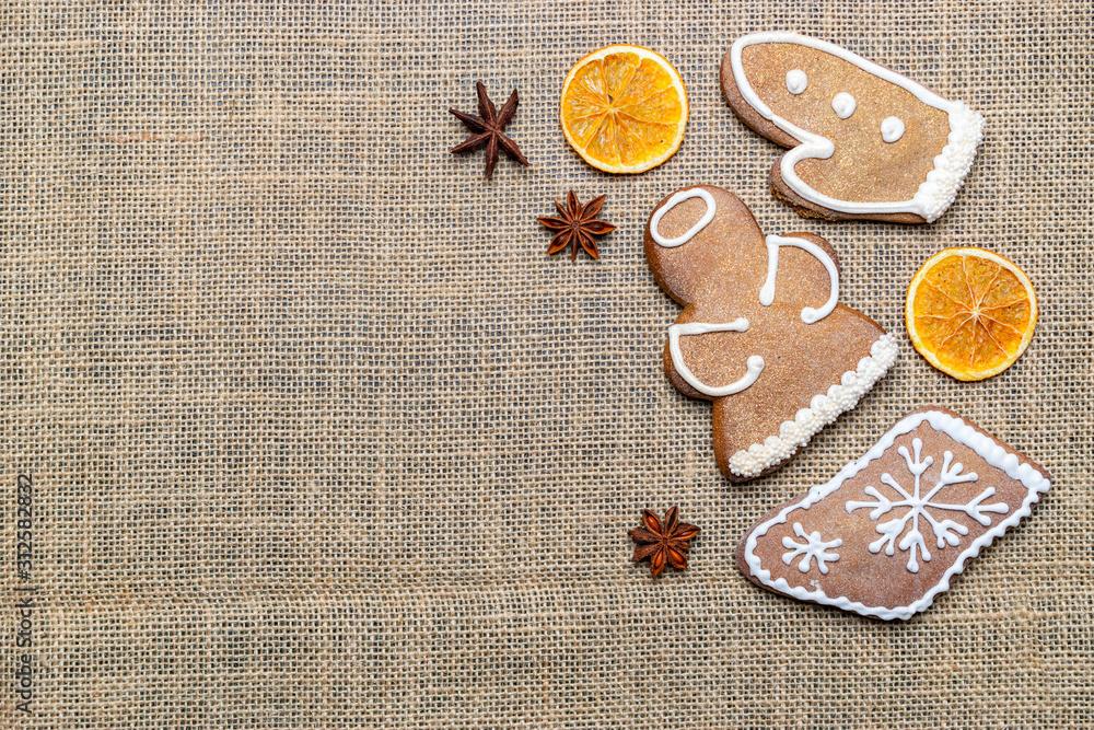 Christmas background. Handmade festive gingerbread cookies. Copy space for text. Winter holidays background mock up Christmas background. Handmade festive gingerbread cookies. Copy space for text. Winter holidays background mock up