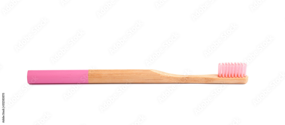 Bamboo toothbrush with pink bristle isolated on white Bamboo toothbrush with pink bristle isolated on white