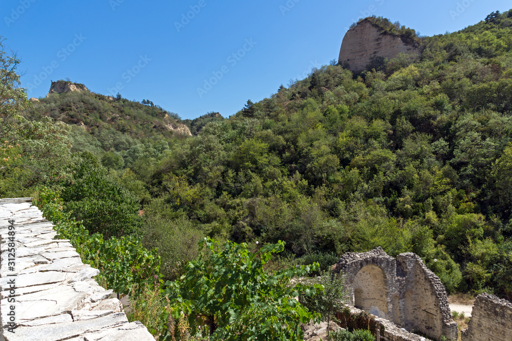 Fototapeta premium Street and old houses in town of Melnik, Bulgaria