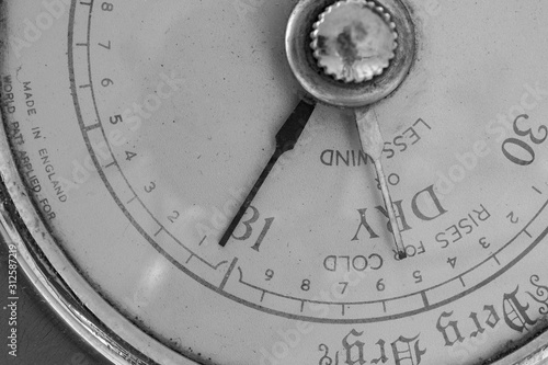 Obraz na plátně Close up of an old antique barometer indicating high pressure and fine weather