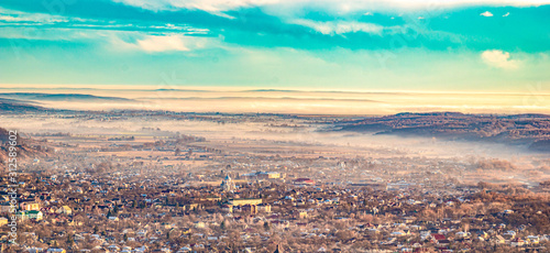 Morning city in the fog