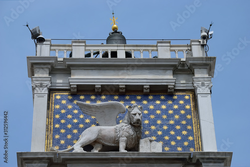 close up of the winged lion statue on St Mark's Clock Tower, Venice Italy