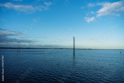 An Electric pole in water © Feng
