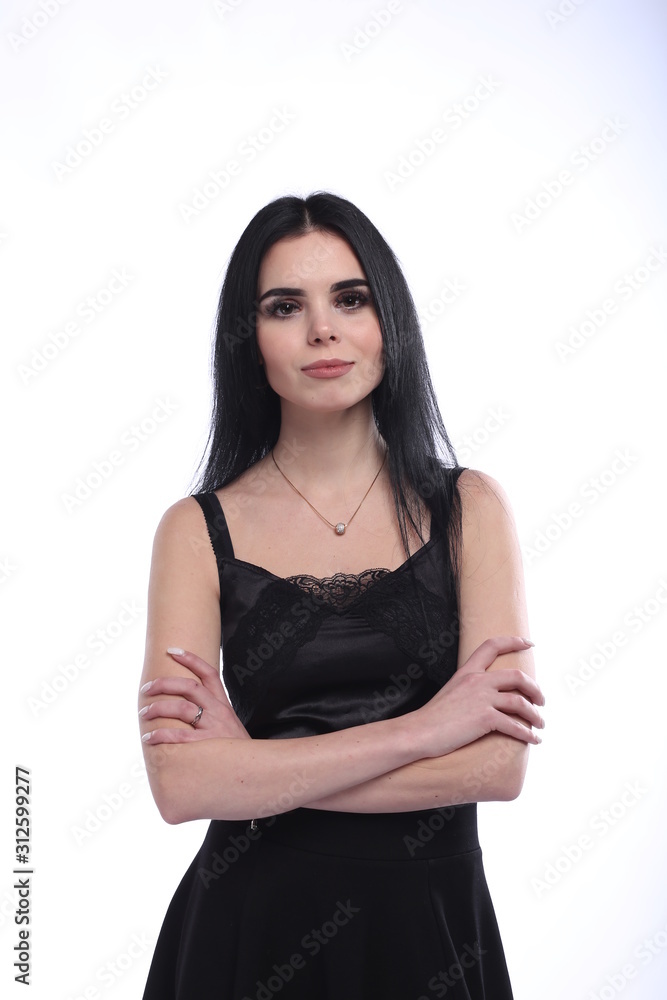 Beautiful young brunette woman in black dress on white background Beautiful young brunette woman in black dress on white background