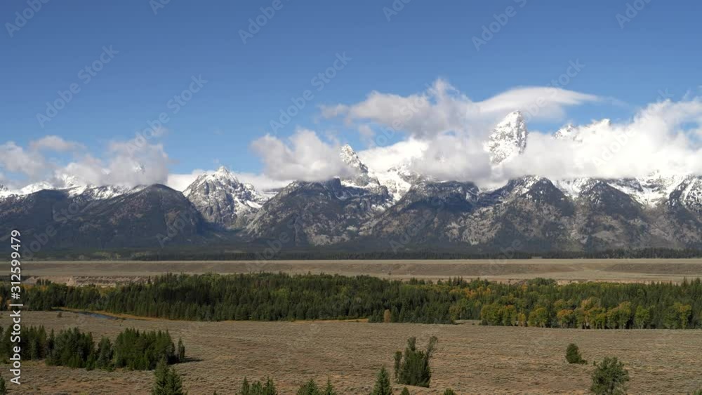 pan of grand teton after an autumn snow storm in grand teton national park of wyoming, usa pan of grand teton after an autumn snow storm in grand teton national park of wyoming, usa