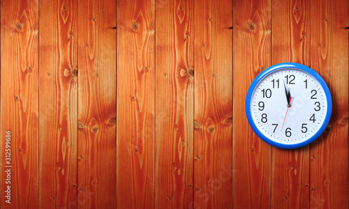 Wallpaper Mural Blue wall clock on a wooden background Torontodigital.ca