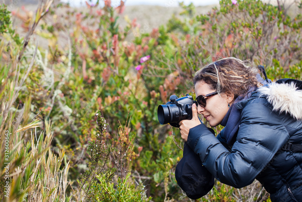 Young woman exploring the nature of a beautiful paramo at the department of Cundinamarca in Colombia Young woman exploring the nature of a beautiful paramo at the department of Cundinamarca in Colombia