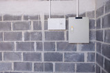 Electrical control box on the wall. Electric control panel power supply boxs on wall background.