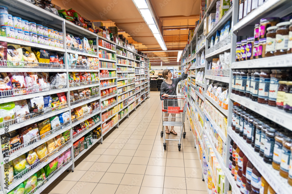 Series of Asian woman shopping groceries in modern supermarket.