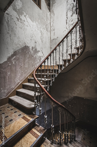 Stairs in old and ruined abandoned house.