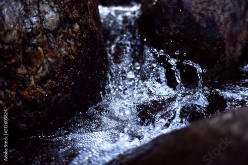 Beautiful waterfall close up © chipanoo