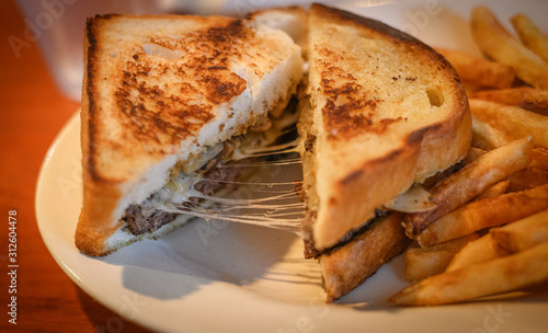 Cheesy Patty Melt with French Fries photo