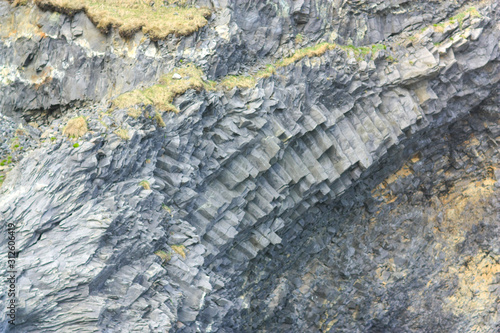 The texture of the basalt cave in Iceland closeup photo