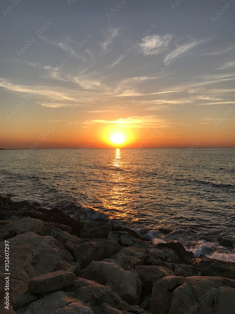 Unedited image of sunset over the sea Unedited image of sunset over the sea