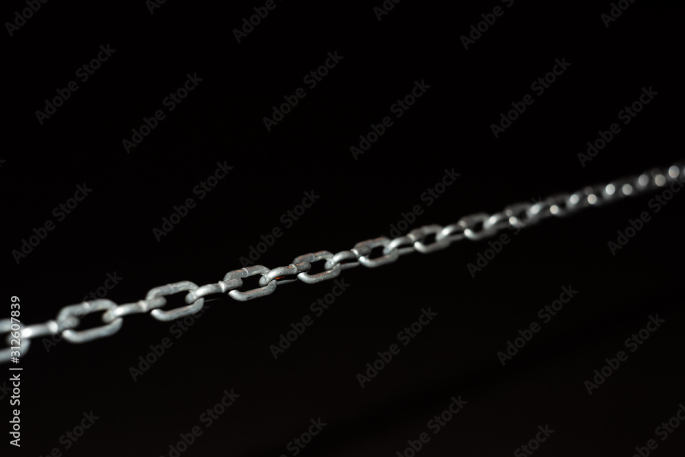 Metal chain on black background Metal chain on black background