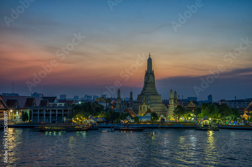 Arun pagoda temple waterfront after sunset, The most famous tourist destination of Thailand