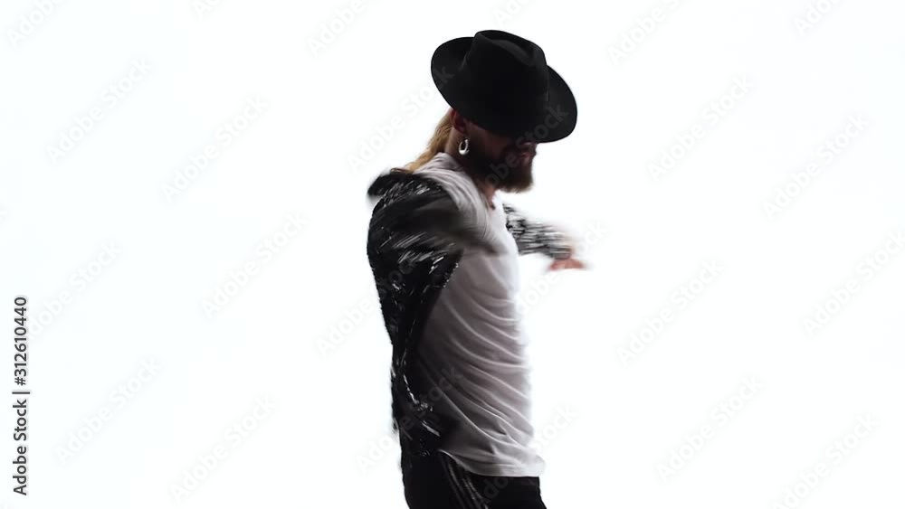 Young stylish teenager is showing dance. Isolated over white background. Close up, slow motion. Young stylish teenager is showing dance. Isolated over white background. Close up, slow motion.
