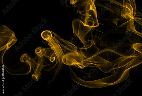 fire of yellow smoke abstract on black background for design