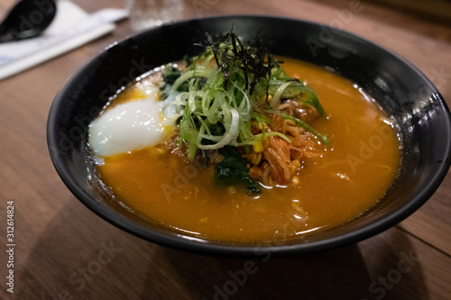 Ramen noodles with egg, seaweed and spring onion