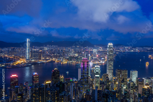 Victoria harbor view from Victoria peak viewpoint with twilight sky