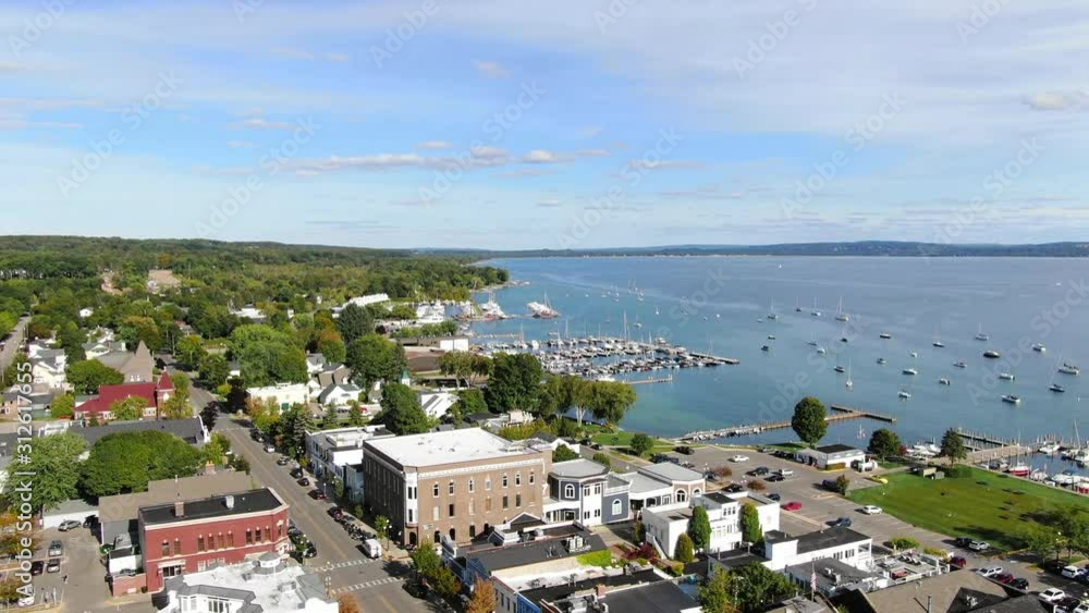 The Beautiful Town of Harbor Springs located in Northern Michigan during Fall Colors lakeside town on blue water clear Lake Michigan The Beautiful Town of Harbor Springs located in Northern Michigan during Fall Colors lakeside town on blue water clear Lake Michigan