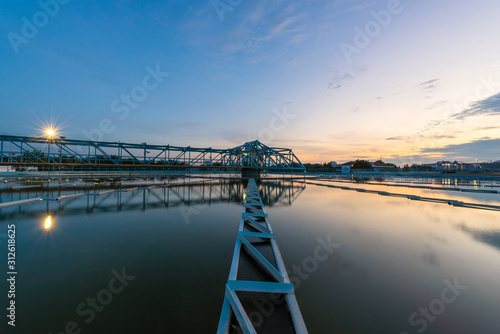 Принти на полотні Water treatment plant with sunset