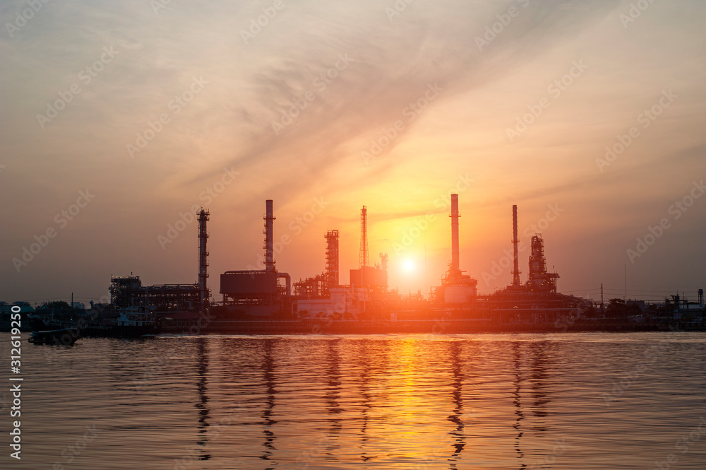 oil refinery with sunrise