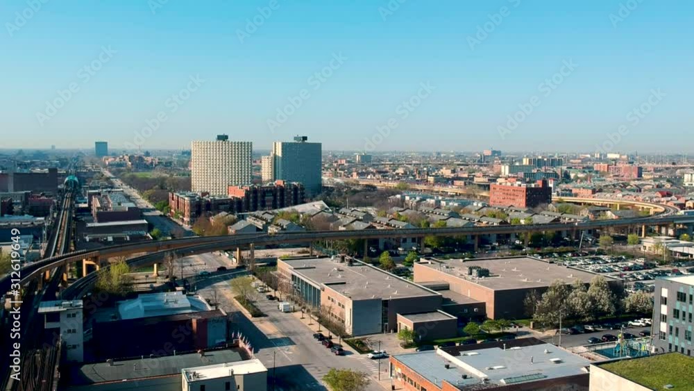 An aerial view of the Chicago transportation system revealing the south side of Chicago. Within distance is the Chinatown across the subway track. An aerial view of the Chicago transportation system revealing the south side of Chicago. Within distance is the Chinatown across the subway track.