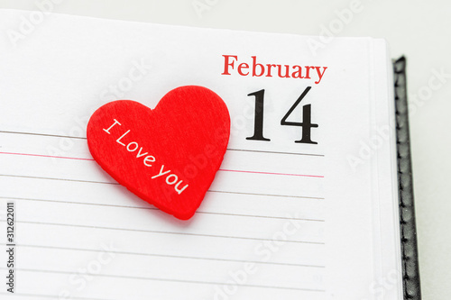 Calendar page with the red heart on February 14 of Saint Valentines day.
